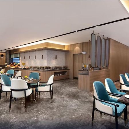 Rezen Hotel Zhuhai Hengqin Border And Exhibition Center Branch Esterno foto