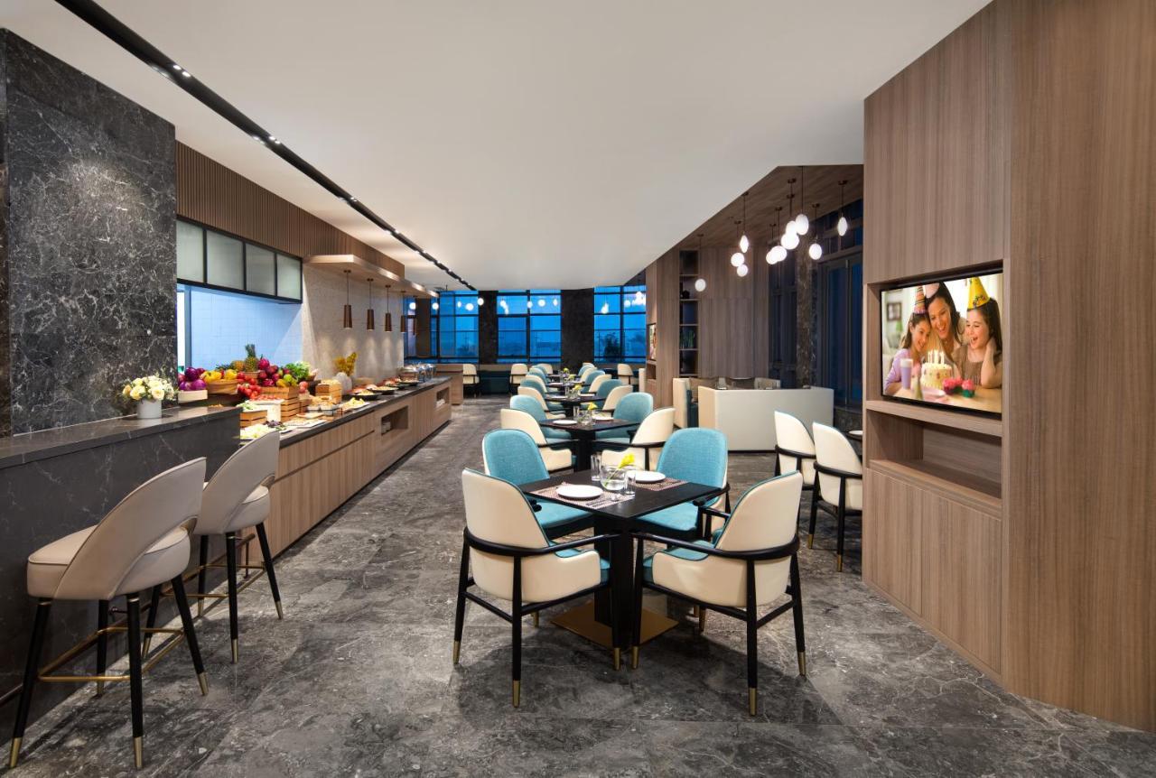 Rezen Hotel Zhuhai Hengqin Border And Exhibition Center Branch Esterno foto